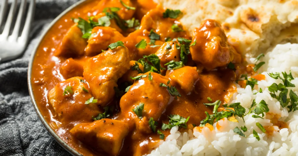 Create an image featuring a woman serving a dish of [alice springs chicken recipe